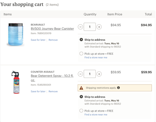 REI.com shopping cart with bear spray and bear can